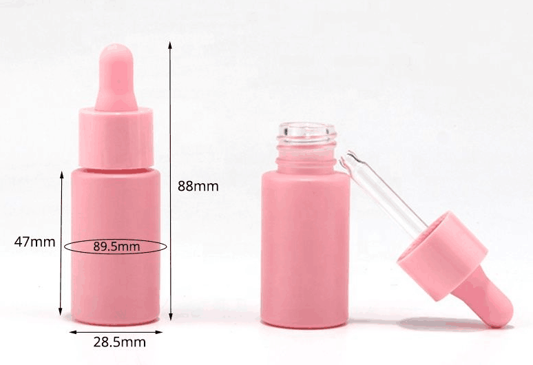Flacon rose de 15 ml pour huile capillaire sérique