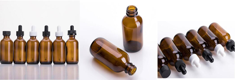 flacon en verre compte-gouttes d'huile essentielle ambre
