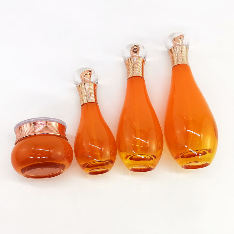 Ensemble de bouteilles cosmétiques orange de luxe