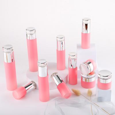 Pot de bouteille en verre cosmétique givré rose
