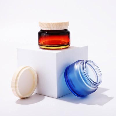 Nouveau bocal en verre rond design avec couvercle à vis de transfert d'eau pour emballage cosmétique