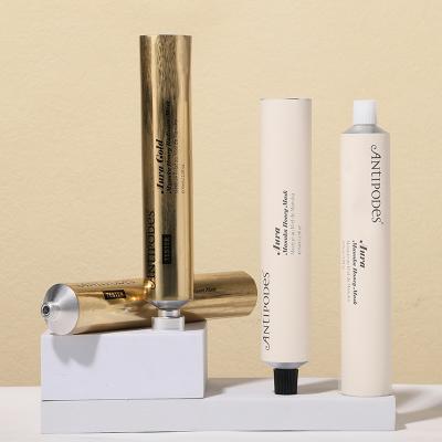 Emballage vide de tube de crème pour les mains doré