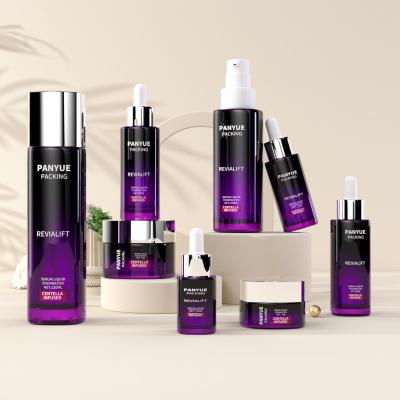 Ensemble de flacons cosmétiques carrés en verre violet