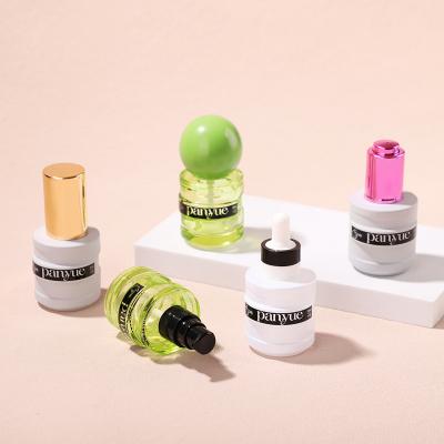 flacon compte-gouttes cylindrique court en verre