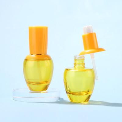 Flacon en verre jaune pour pompe à essence