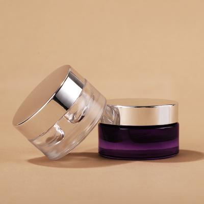 Pot de soins de la peau violet à ouverture séparée