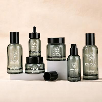 Ensemble de flacons cosmétiques en verre gris fumé