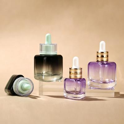 Flacon compte-gouttes triangulaire en verre