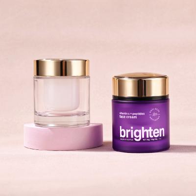Pot de crème cosmétique violet rechargeable