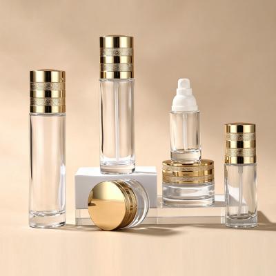 Ensemble cosmétique en verre transparent avec couvercle doré