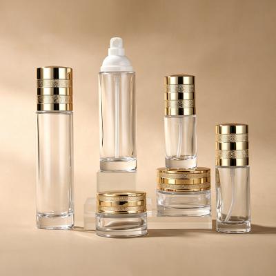 Clear Glass Cosmetic Set with Gold Lid
